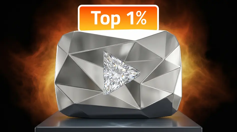 YouTube Diamond Play Button creator award with large colorless crystal centrepiece on a silver-plated metal base with dramatic studio lighting