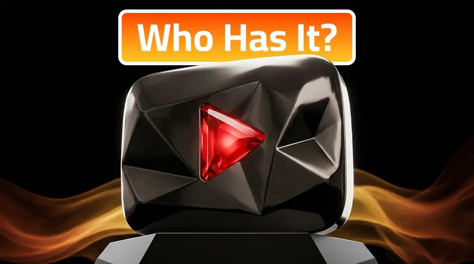YouTube Red Diamond Play Button with dark red Baccarat crystal centrepiece on silver-plated metal base with dramatic studio lighting